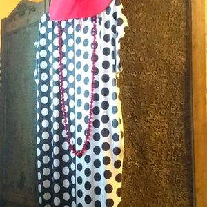 Beautiful black and white pocketed polka dot dress. Size medium to large dress